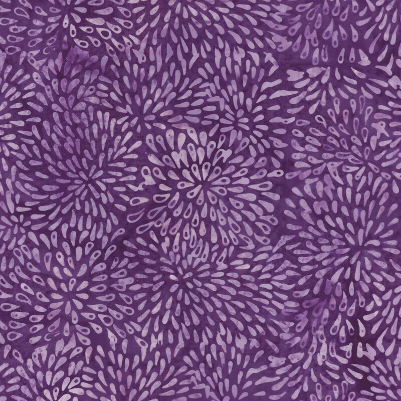 Purple fabric with light purple bursts.