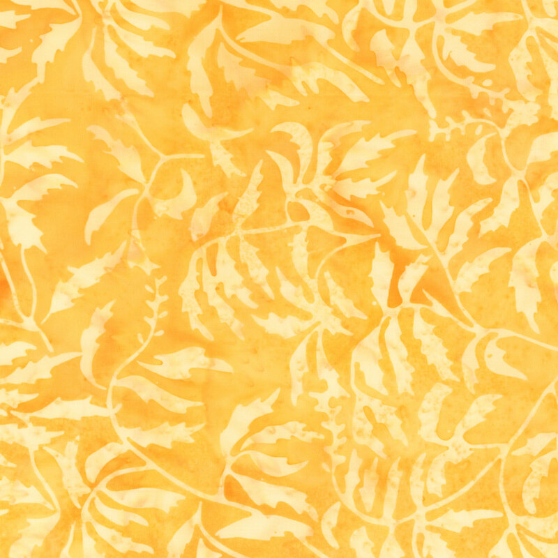 Light orange fabric with light leaf pattern.