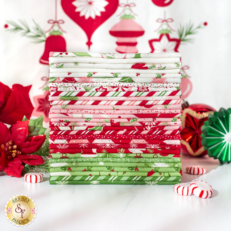An image of a stacked Fat Quarter Set with Christmas decor on a white background.