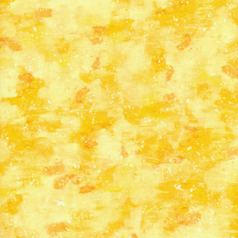 This fabric has a tonal yellow painted and splattered texture