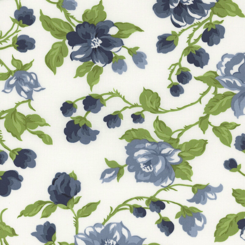 light cream fabric scattered dusty blue flowers and green vines