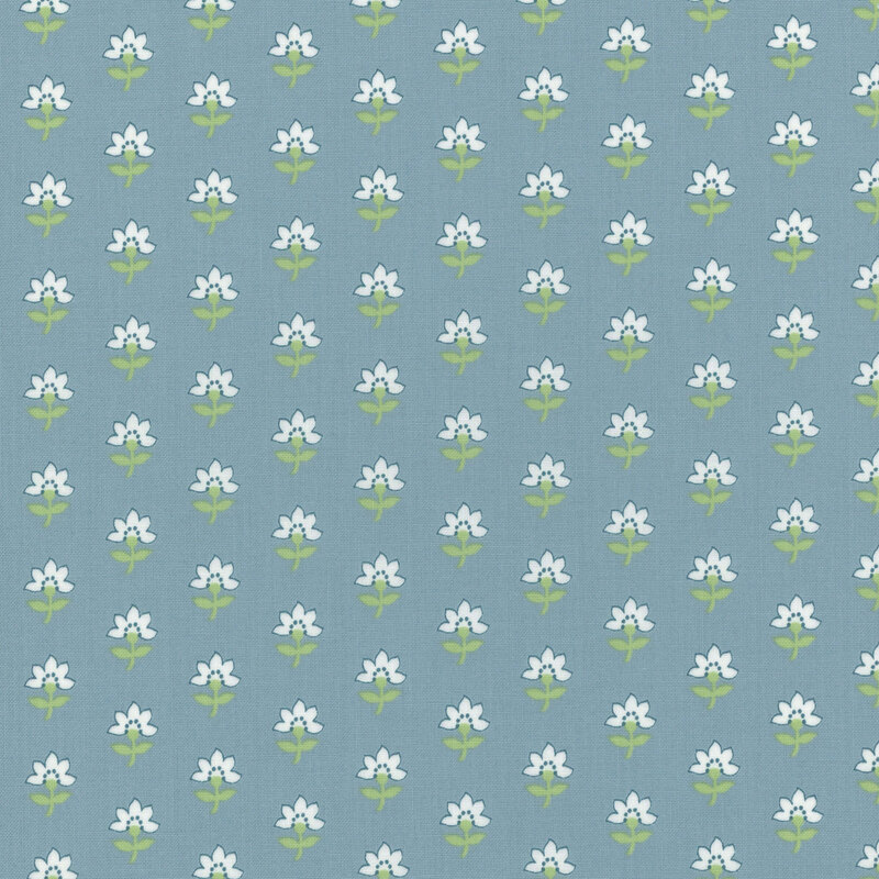 light dutch blue fabric with diagonal rows of white flowers