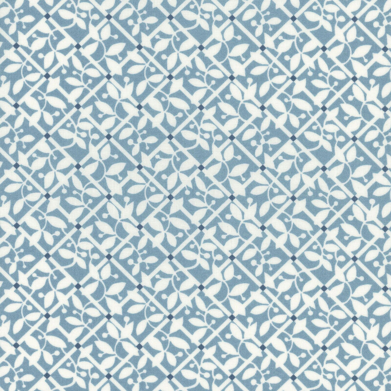 light blue fabric with a white mosaic pattern of white vines and leaves