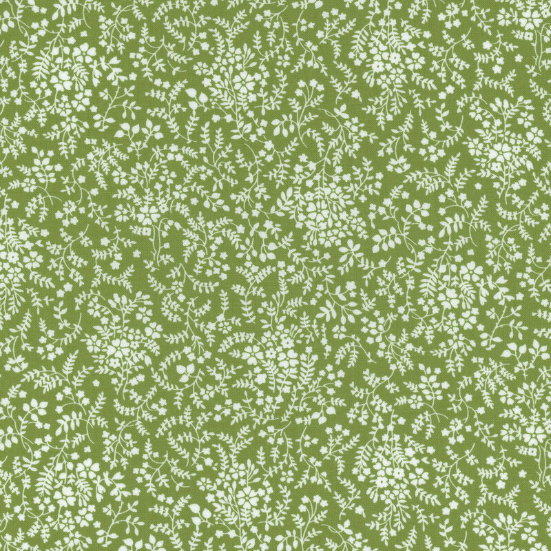 meadow green fabric with packed white flowers and leaves