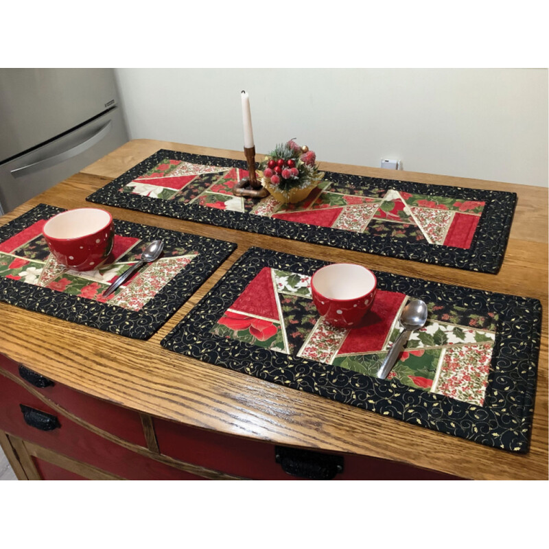 Finished project in triplicate, three different lengths and arrangements, staged on a dining table with a candle and ceramics 