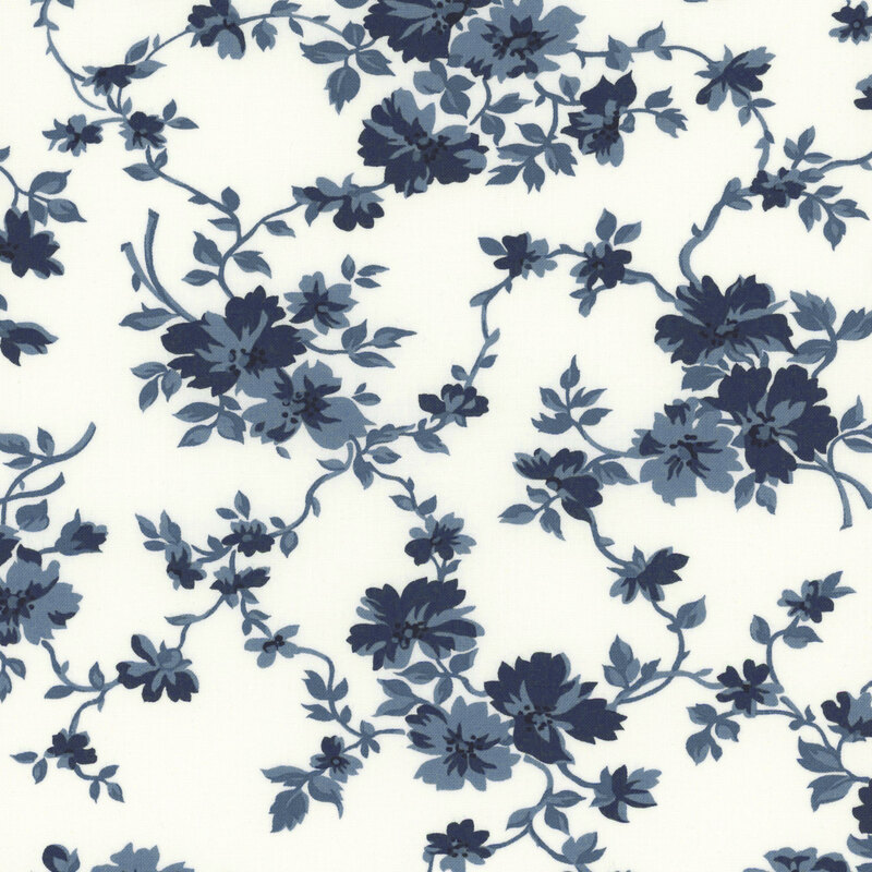 light cream fabric with flowing tonal blue vines flowers