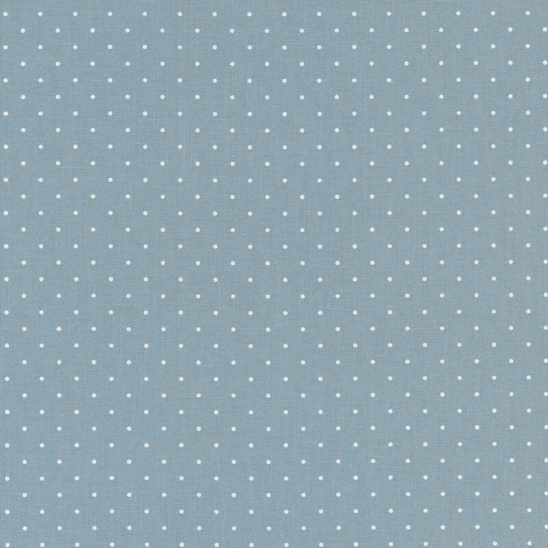light blue fabric with small white polka dots
