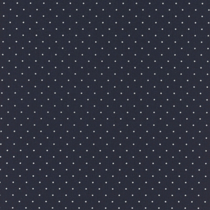 navy blue fabric with small white polka dots