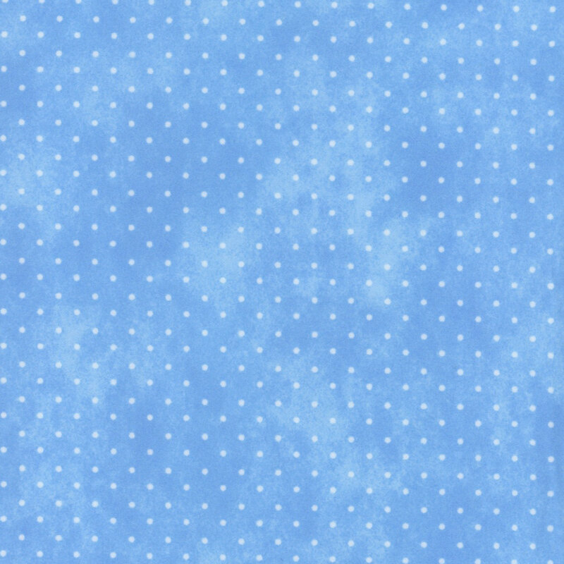 Mottled Blue fabric with small white polka dots.