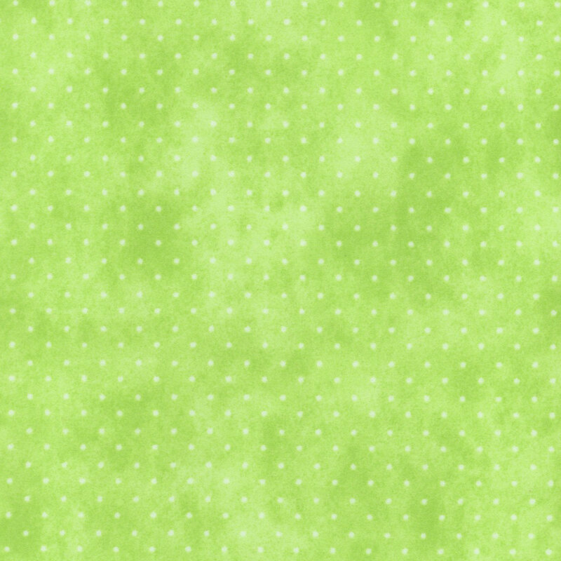 Mottled light green fabric with small white polka dots.