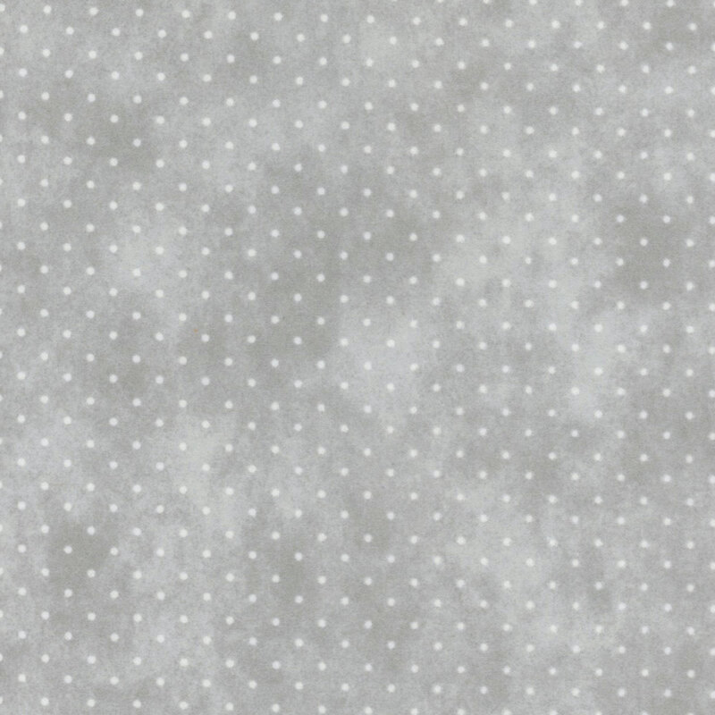 Mottled gray fabric with small white polka dots.