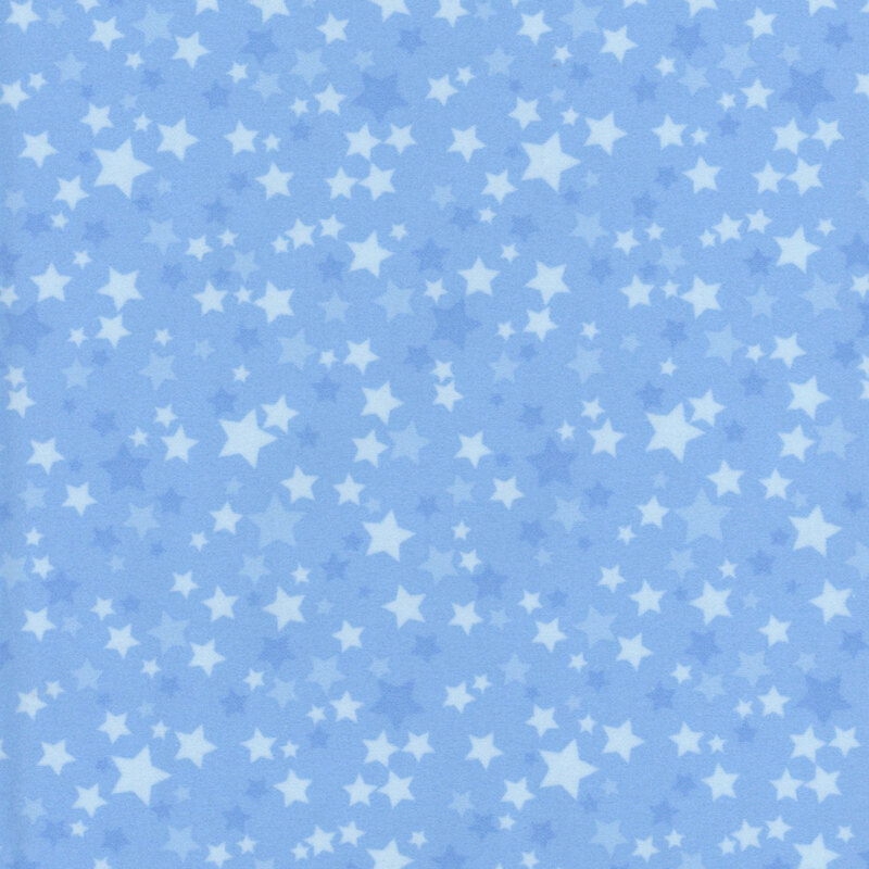 Blue fabric with varying shades of blue stars.