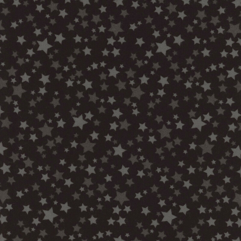 Black fabric with a variety of gray stars.