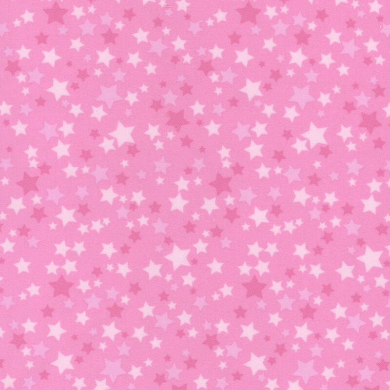 Pink fabric with a variety of pink stars.