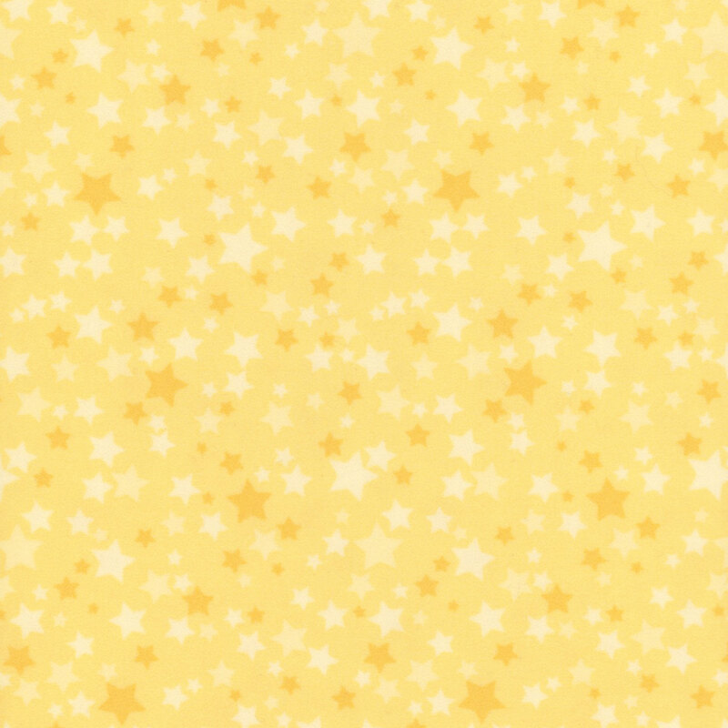 Yellow fabric with a variety of yellow stars.