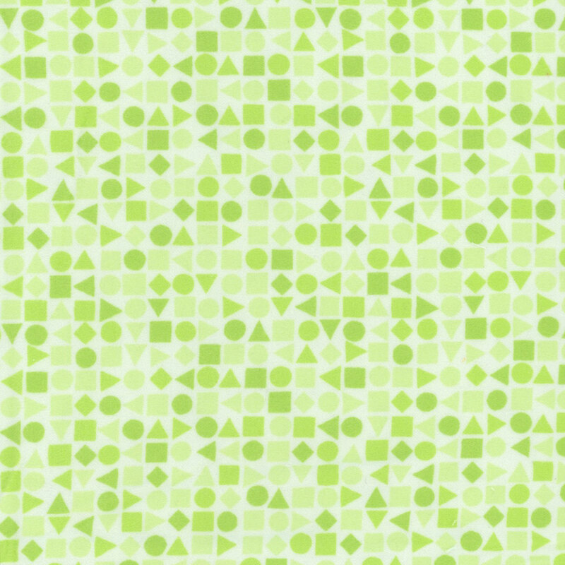 Green geometric shapes on white fabric.