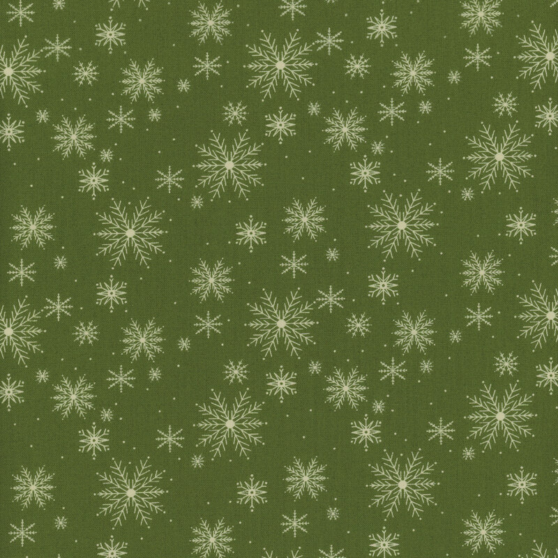 dark green fabric with pale green snowflakes in varying sizes