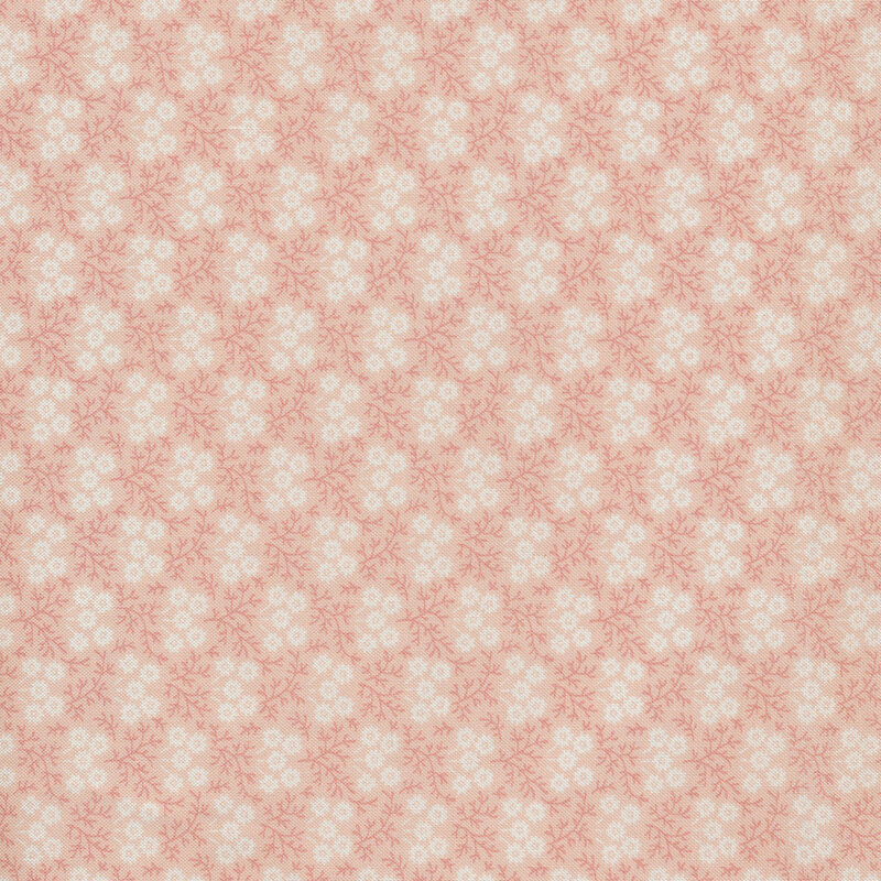 Floral print with small white flowers against a light pink fabric.