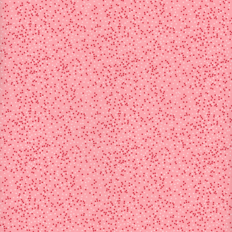 Light pink fabric with tiny, white and red dots all over
