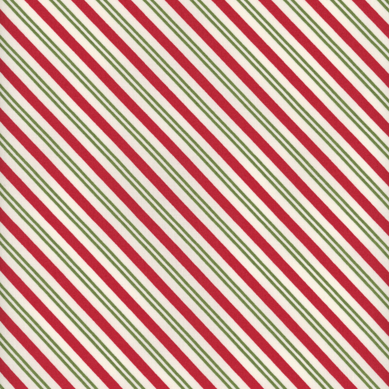 White fabric with diagonal stripes of varying widths in green and red