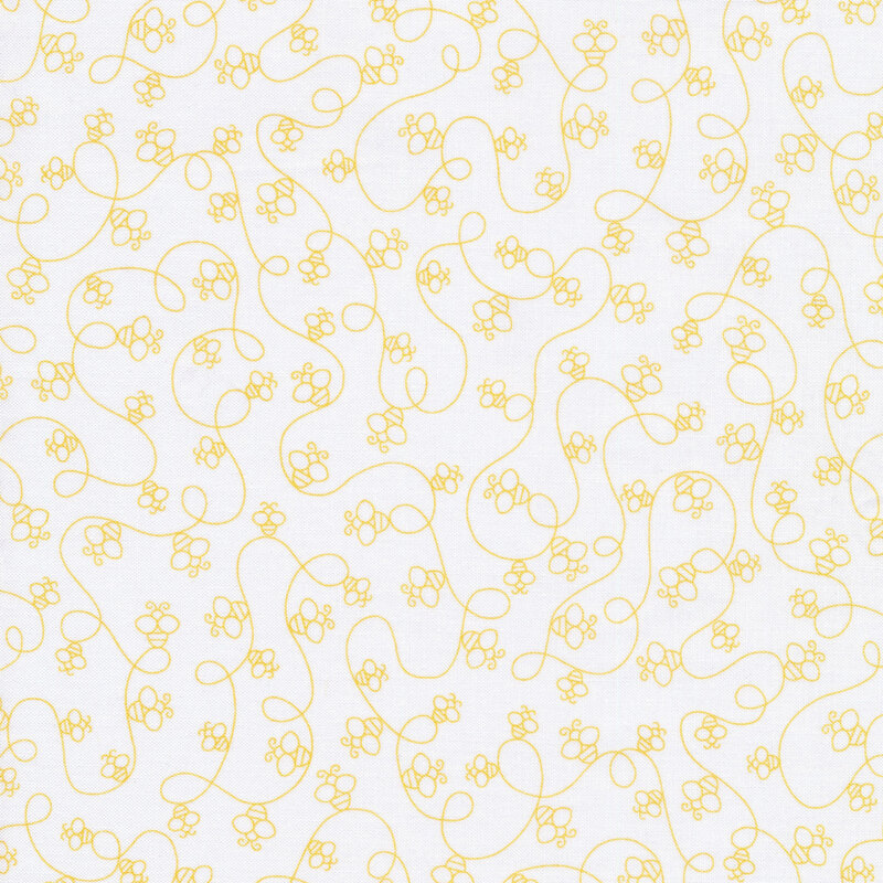 Yellow curlicue bees patterned fabric.