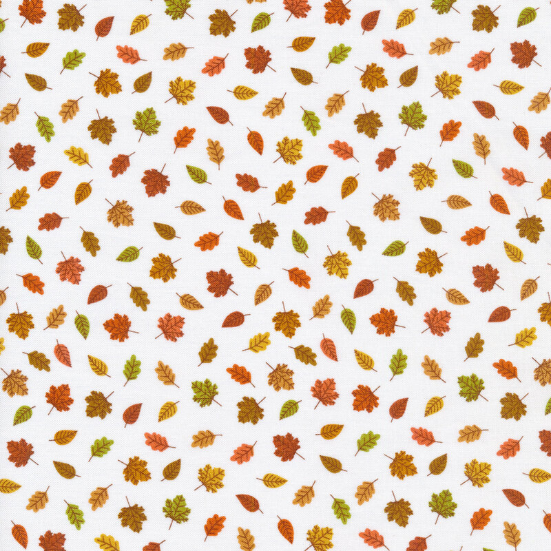 Orange, brown, and yellow leaves falling fabric.