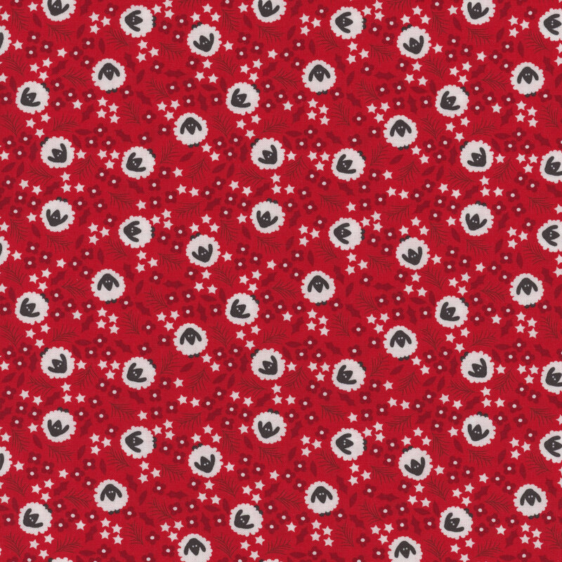 Red fabric with clusters of white stars and red flowers and stylized white and gray sheep