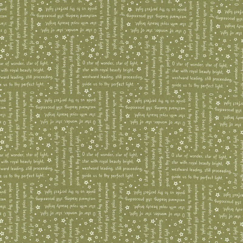Green fabric with lines from the We Three Kings Christmas carol in white arranged in stanzas perpendicular to one another.
