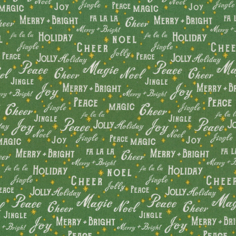 This fabric is green with white words of holiday cheer, with small yellow star accents.