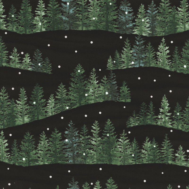 snowy black woodland forest fabric featuring many trees