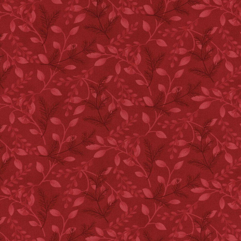 beautiful red fabric with scattered tonal branches and fir boughs