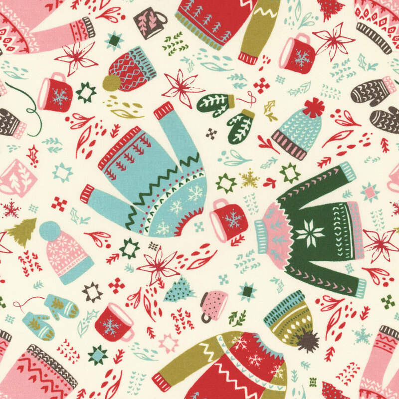 white fabric with scattered mugs, Christmas sweaters, beanies, and mittens in shades of pink, red, green, and aqua