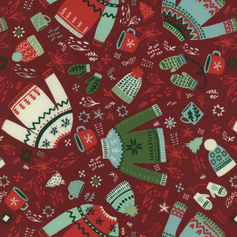burgundy red fabric with scattered mugs, Christmas sweaters, beanies, and mittens in shades of cream, red, green, and aqua