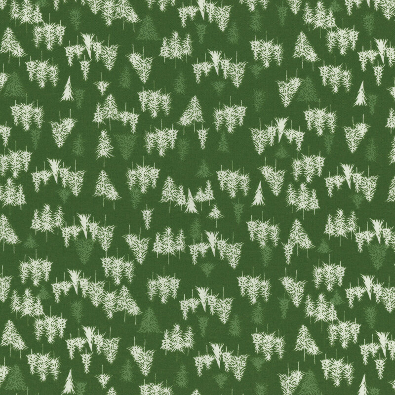 green fabric with scattered sage green and cream fir trees