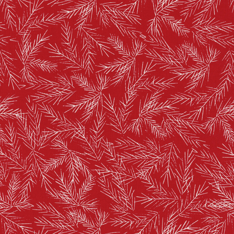 beautiful vibrant red fabric with scattered white fir boughs