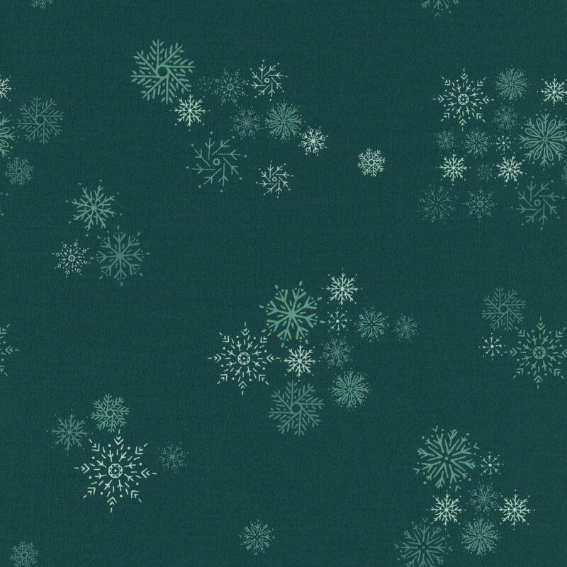 dark teal fabric with scattered aqua and white snowflakes