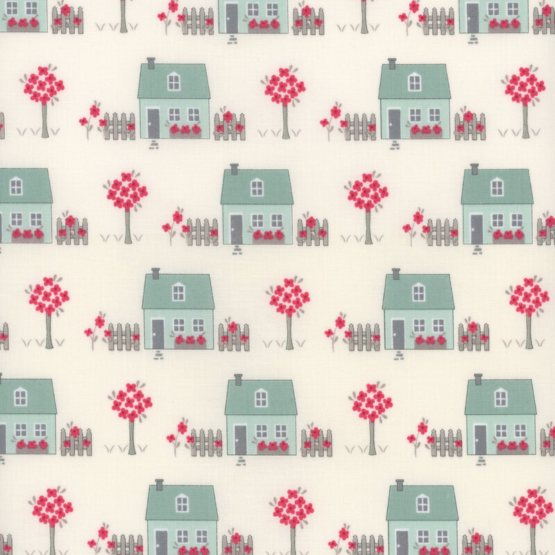 fabric with houses and trees in shades of blue and red on cream background