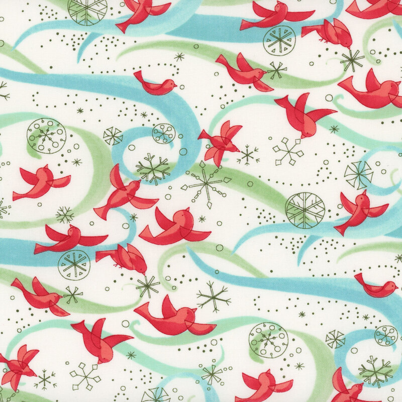 red cardinals flying amidst green snowflake outlines pop against the white background fabric with aqua and light green swirls
