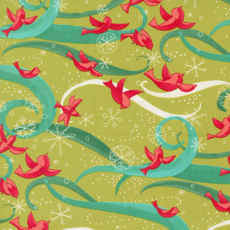 red cardinals flying amidst white snowflake outlines pop against the vivid green background fabric with aqua and white swirls