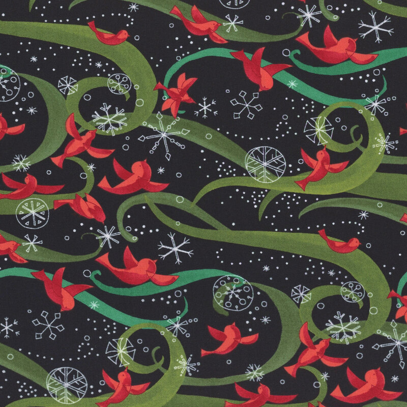 red cardinals flying amidst white snowflake outlines pop against the rich black background fabric with teal and green swirls