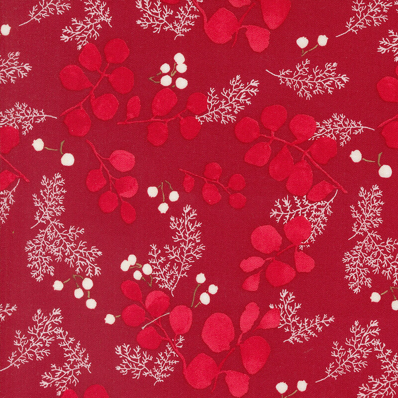 lovely red fabric with scattered bright red eucalyptus leaves, white fir fronds, and white mistletoe berries