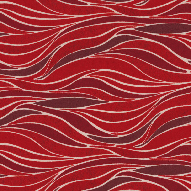lovely red fabric with a modern swirl pattern in various shades of red