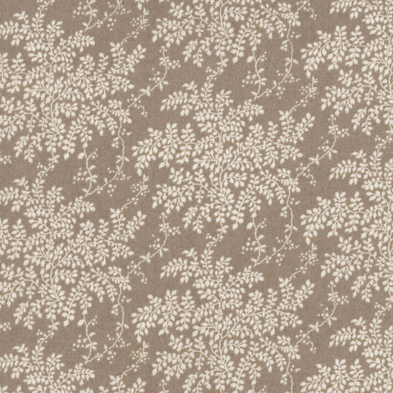 lovely warm taupe fabric with scattered white leaves and vines