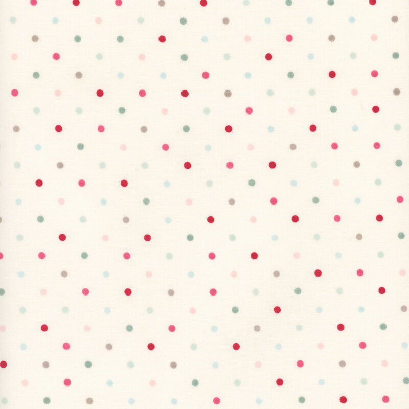 Red, pink, aqua, teal, and gray polka dots tossed on a cream fabric