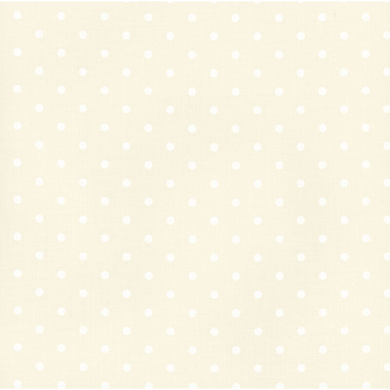 White polka dot print on cream fabric