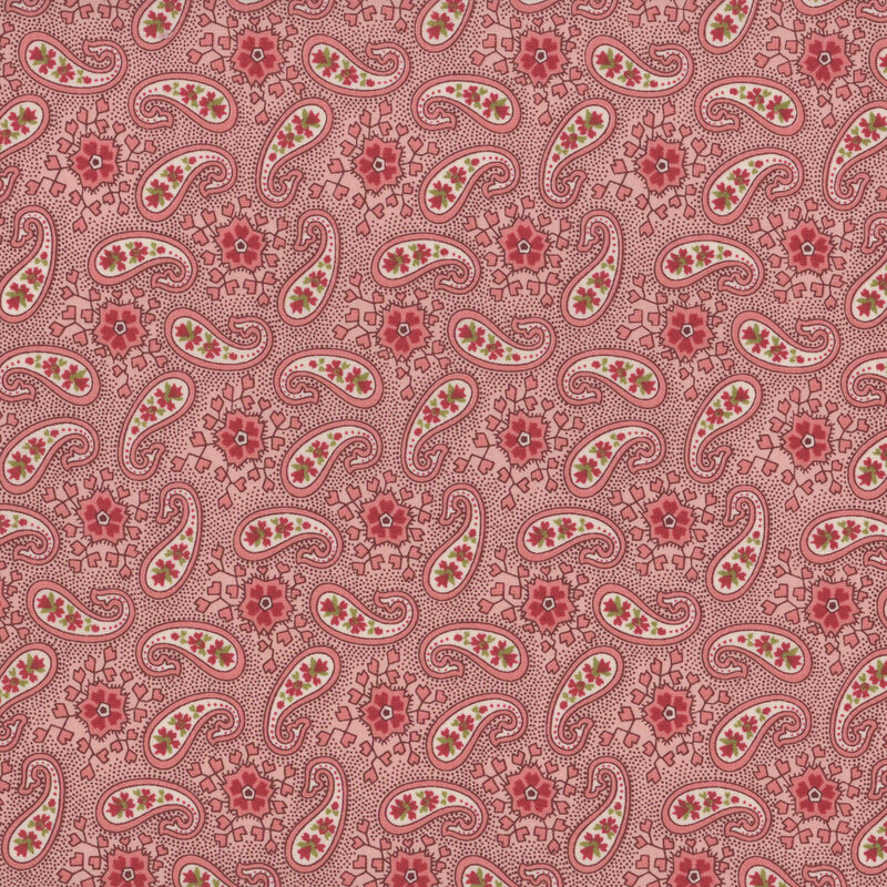 Pink textured fabric with a red floral and cream paisley design