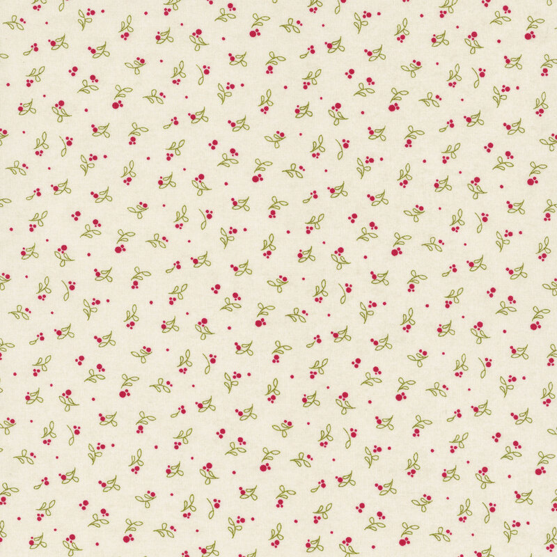 lovely white fabric with a ditsy pattern of red dots and light green leaves