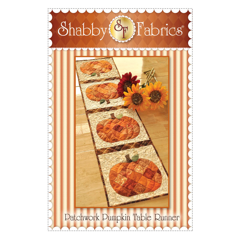The front of the Patchwork Pumpkin Table Runner pattern by Shabby Fabrics