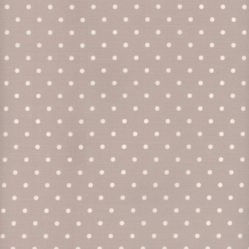 cream polka dots on a stone gray fabric