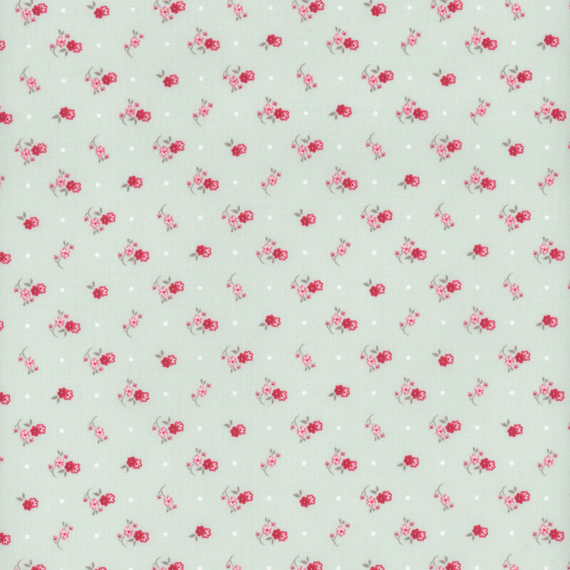 Small pink and red floral motifs, like little corsages tossed onto an aqua fabric